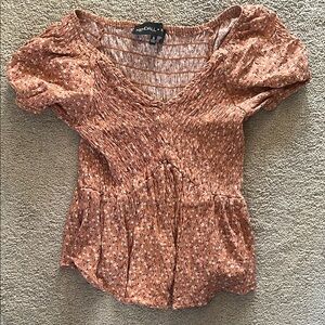 Kendall & Kylie Smocked Peplum Blouse in Orange Gold